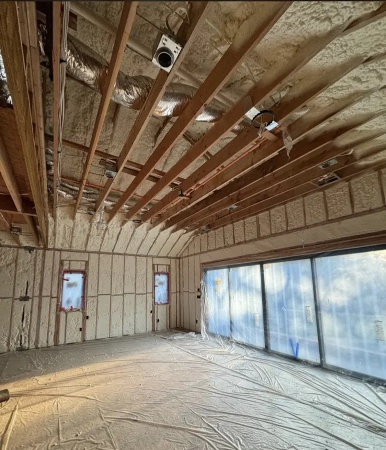 Interior walls and ceiling insulated with spray foam during new construction in St. Charles